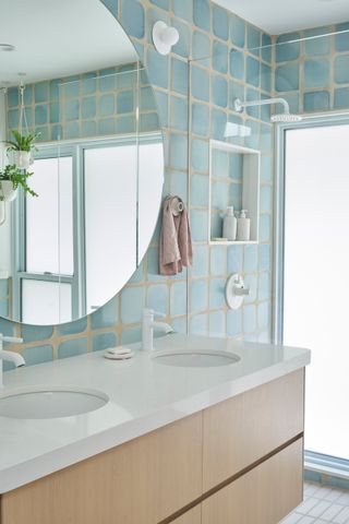 a bathroom with chunky grouted tiles