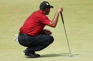 Tiger Woods wearing a yellow ribbon on his cap during the 2020 Memorial Tournament