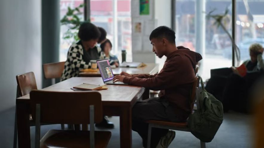 MacBook Air M2 being used by a person sat at a desk