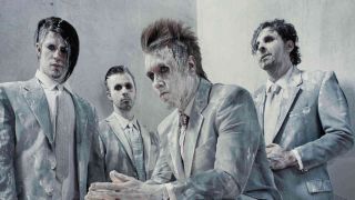 Papa Roach in white clothes and make up in 2013