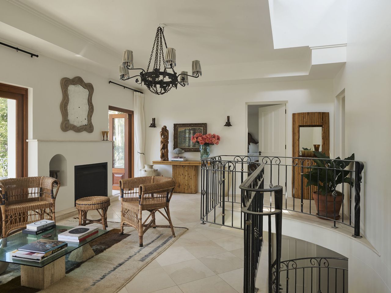 The Spanish inspired landing with metal railings and a European influenced lighting feature