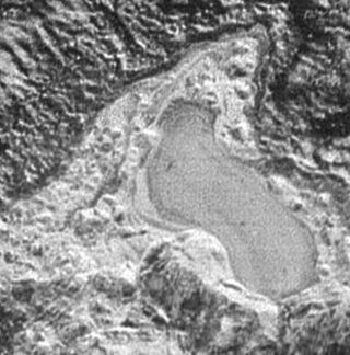 This photo, capture by NASA's New Horizons probe during its July 2015 Pluto flyby, shows an apparent ancient nitrogen lake on the dwarf planet.