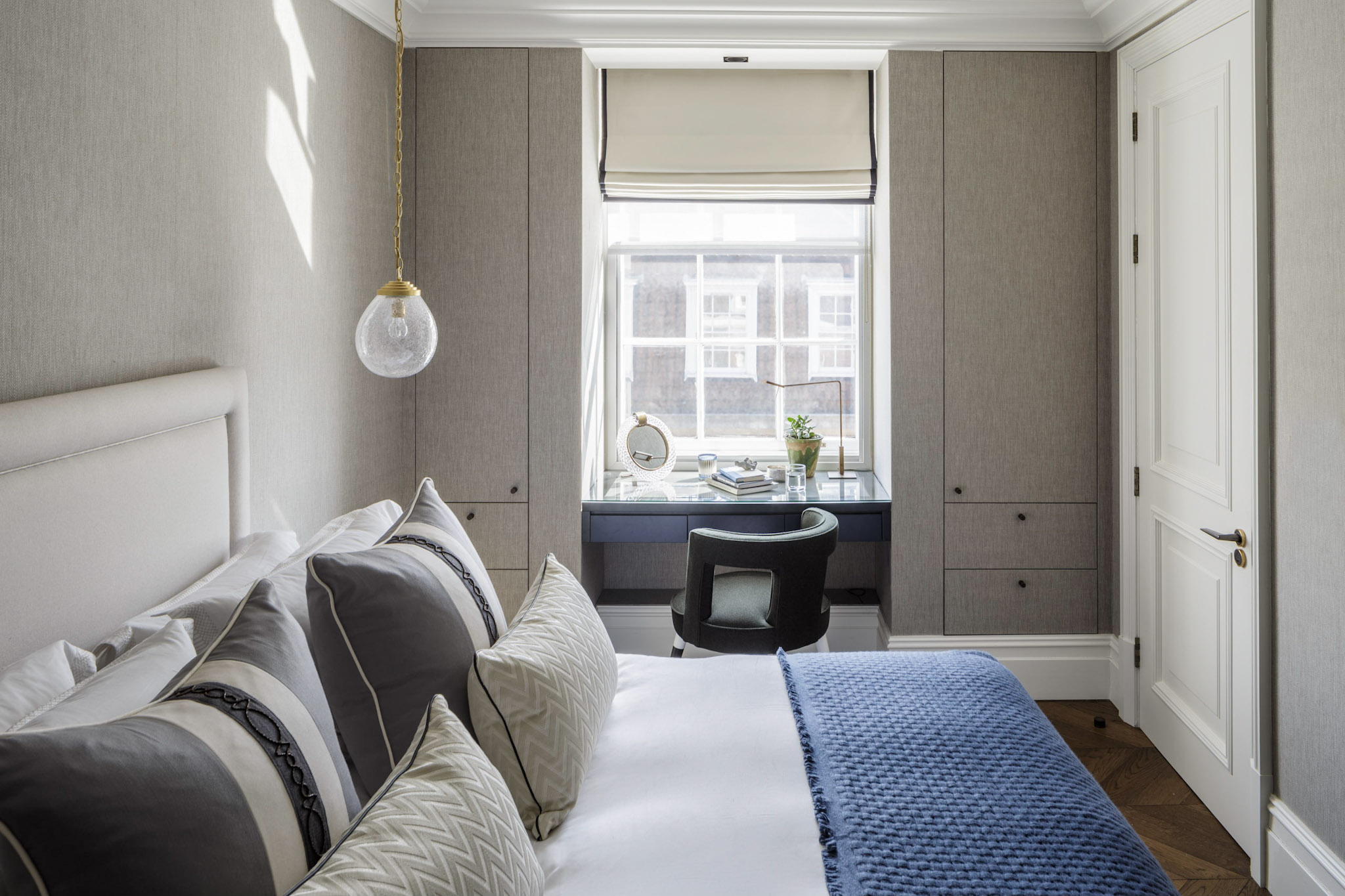 small apartment organization ideas floor to ceiling built-in storage by Gunter & Co