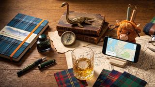 A selection of Scotland-inspired home office accessories on a desk