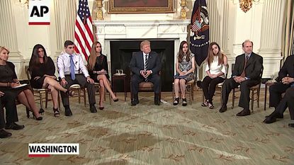 Trump listens to school shooting survivors