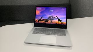 A Surface Laptop Studio, one of the best touchscreen laptops, on an office table top.