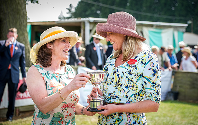 Hound show secretary Rachael Holdsworth awards Jane Strawson, joint-master of the Grove and Rufford, with one of many items of silverware taken back to their Nottinghamshire kennels