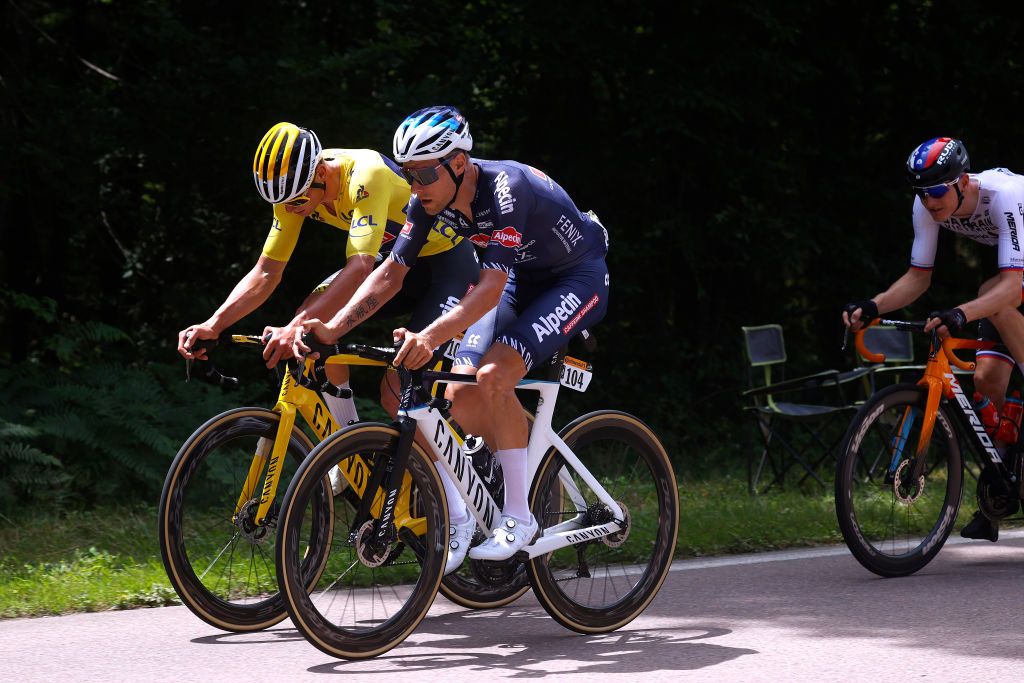 LE CREUSOT FRANCE JULY 02 Mathieu Van Der Poel of The Netherlands yellow leader jersey Xandro Meurisse of Belgium and Team AlpecinFenix Matej Mohori of Slovenia and Team Bahrain Victorious during the 108th Tour de France 2021 Stage 7 a 2491km km stage from Vierzon to Le Creusot 369m LeTour TDF2021 on July 02 2021 in Le Creusot France Photo by Chris GraythenGetty Images
