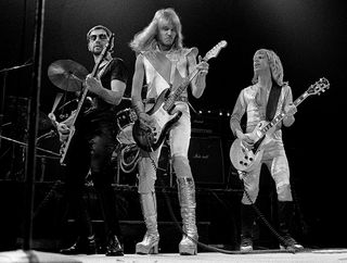 (from left) Chuck Panozzo, James "JY" Young and Tommy Shaw of STYX performs during Z-93 & U.S. Marines Toys for Tots at The OMNI Coliseum in Atlanta Georgia, December 14, 1980