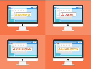 four desktops with alert signs