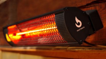 Best patio heater: Gtech Heatwave lifestyle on the wall