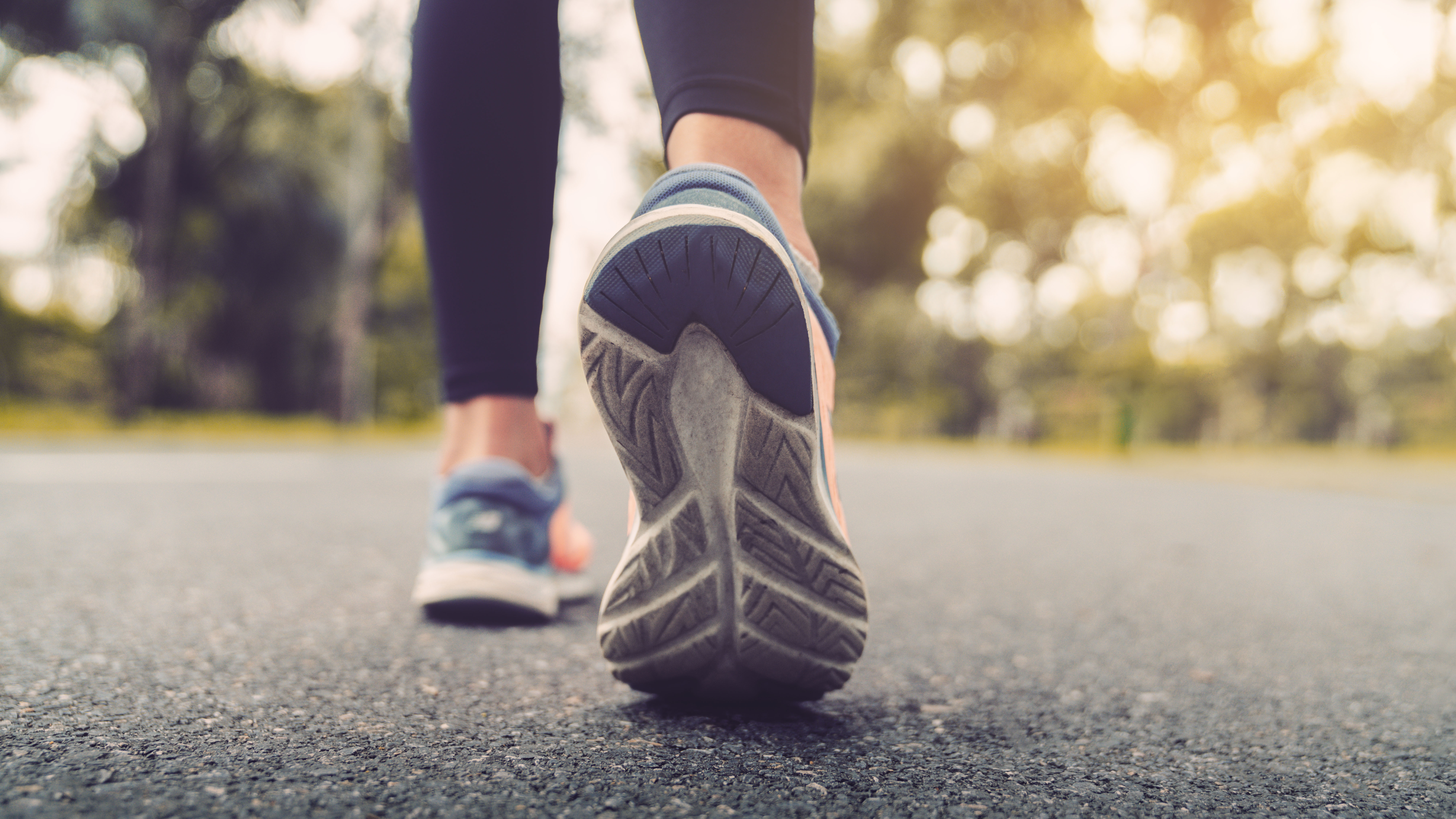 Close-up of underside of woman's running shoe