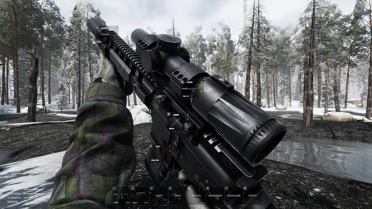 A soldier holds up a sniper rifle for inspection