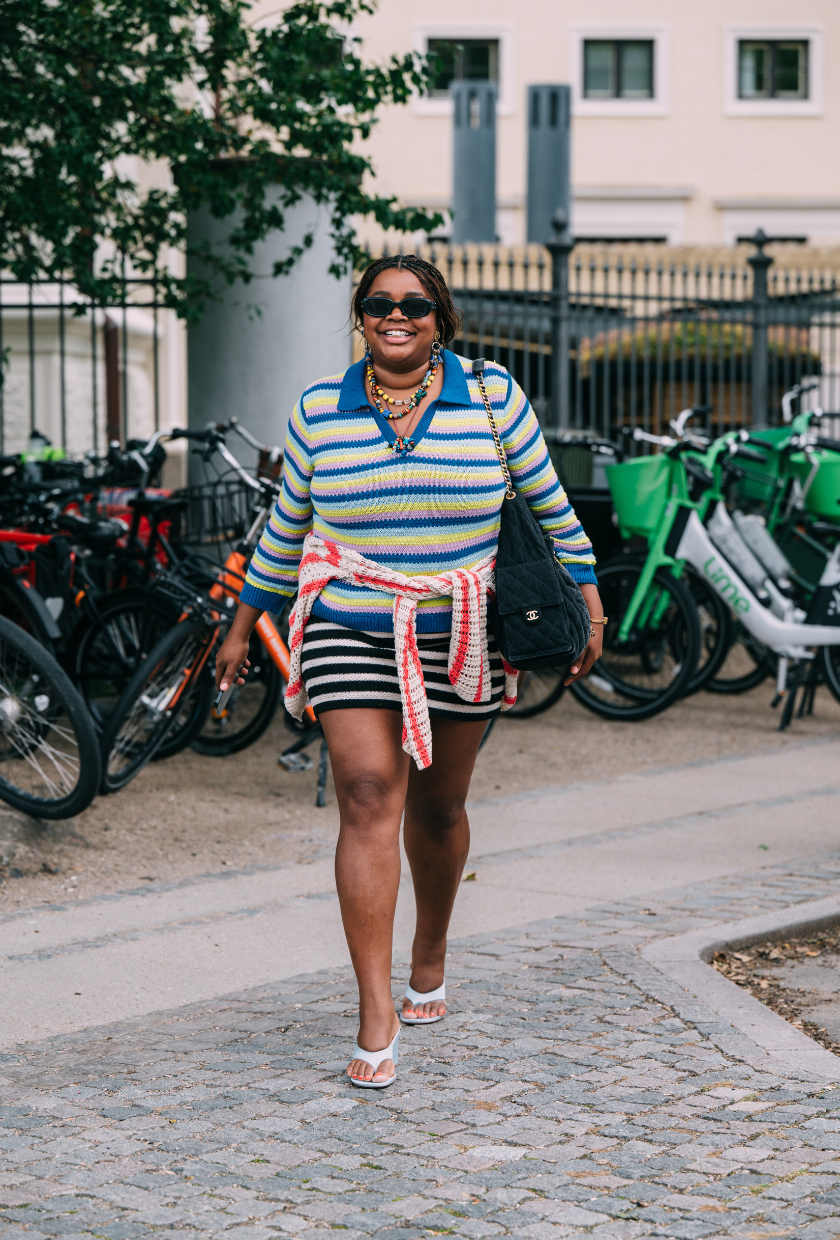An image of a guest at Copenhagen Fashion Week wearing one of the best Scandi fashion brands.