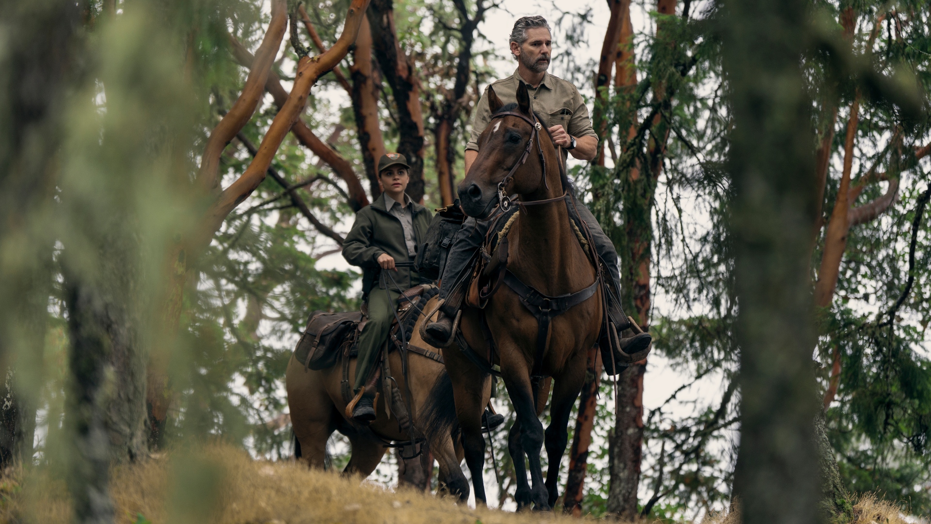 Kyle and Vasquez ride horses in Untamed