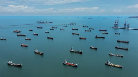 parked oil tankers waiting to take on cargo