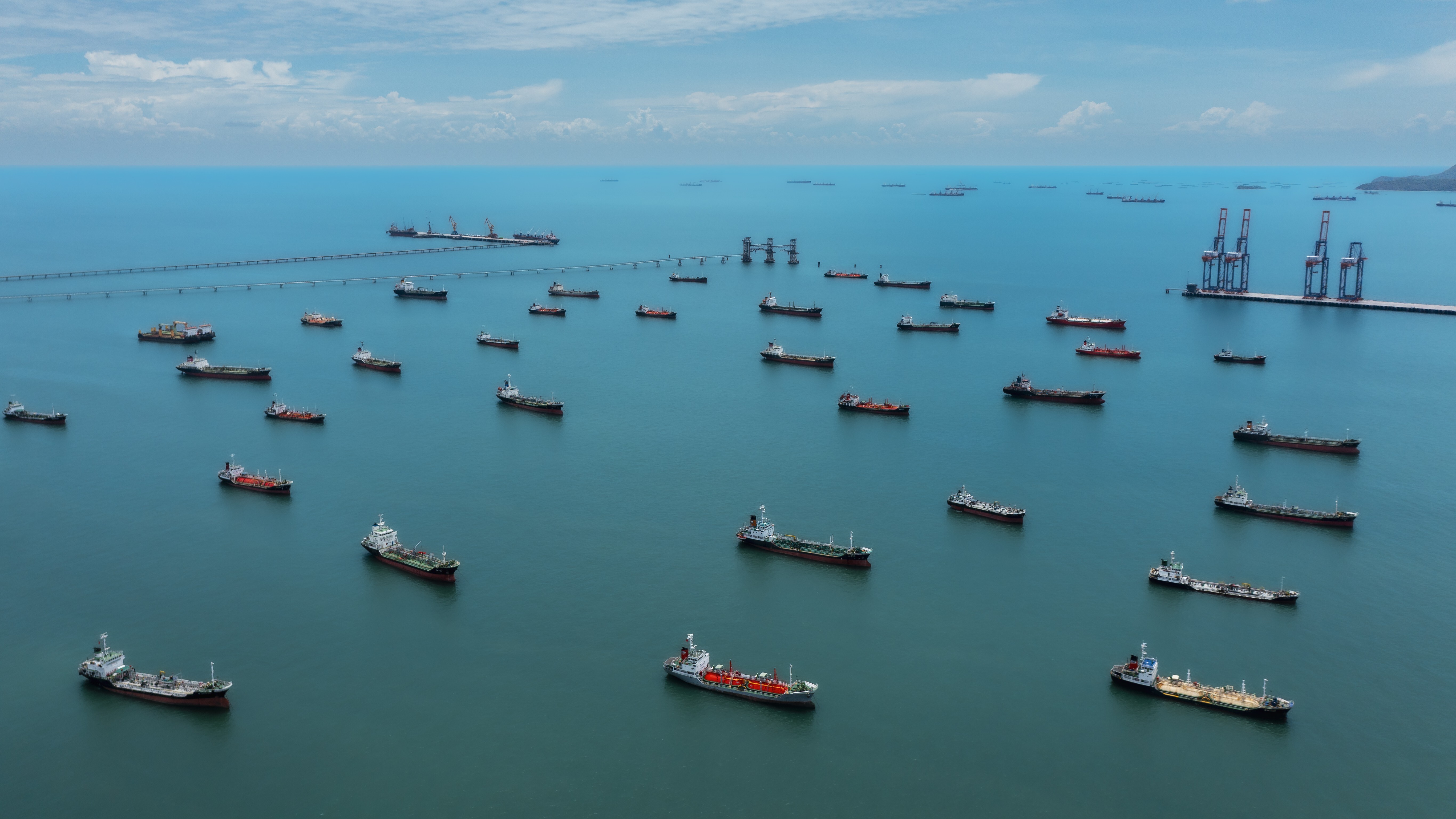 parked oil tankers waiting to take on cargo