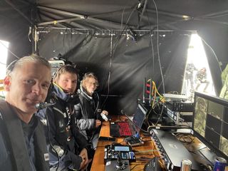 Clear-Com and Audio-Technica solutions and products at work with three people helping a submarine expedition.