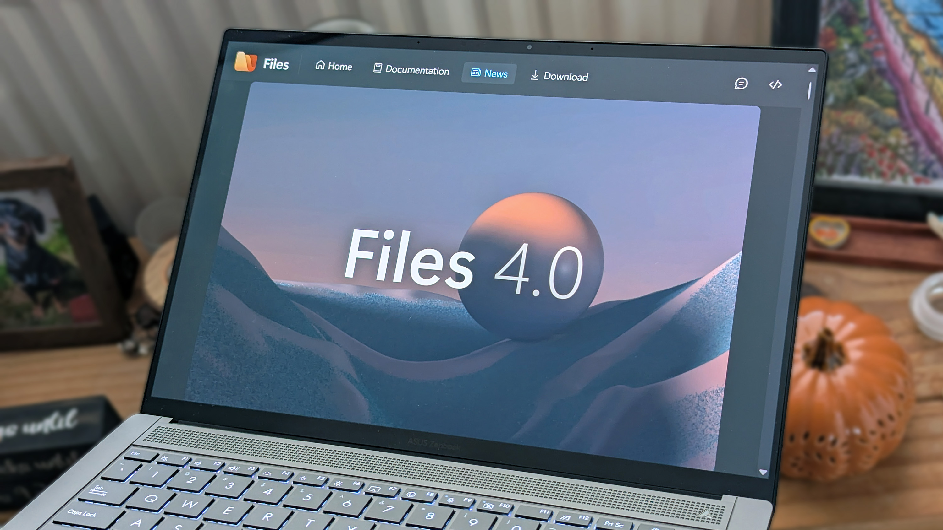 Files 4.0 app promotional images on an ASUS Zenbook laptop screen.
