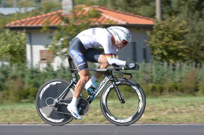 Tony Martin (Germany) scorched the Worlds time trial course for his third straight world title and a new record for fastest average speed