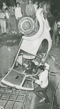 Black and white photograph of car crash