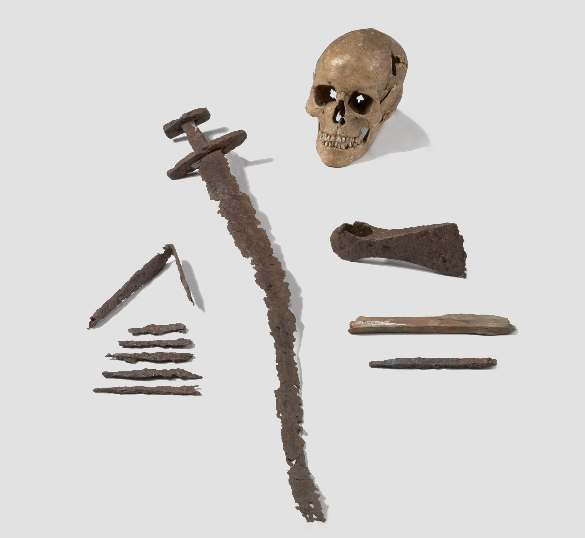 a skull and some weapons