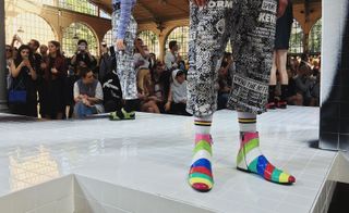 Models on the runway modelling the socks collection from Kenzo S/S 2017 collection