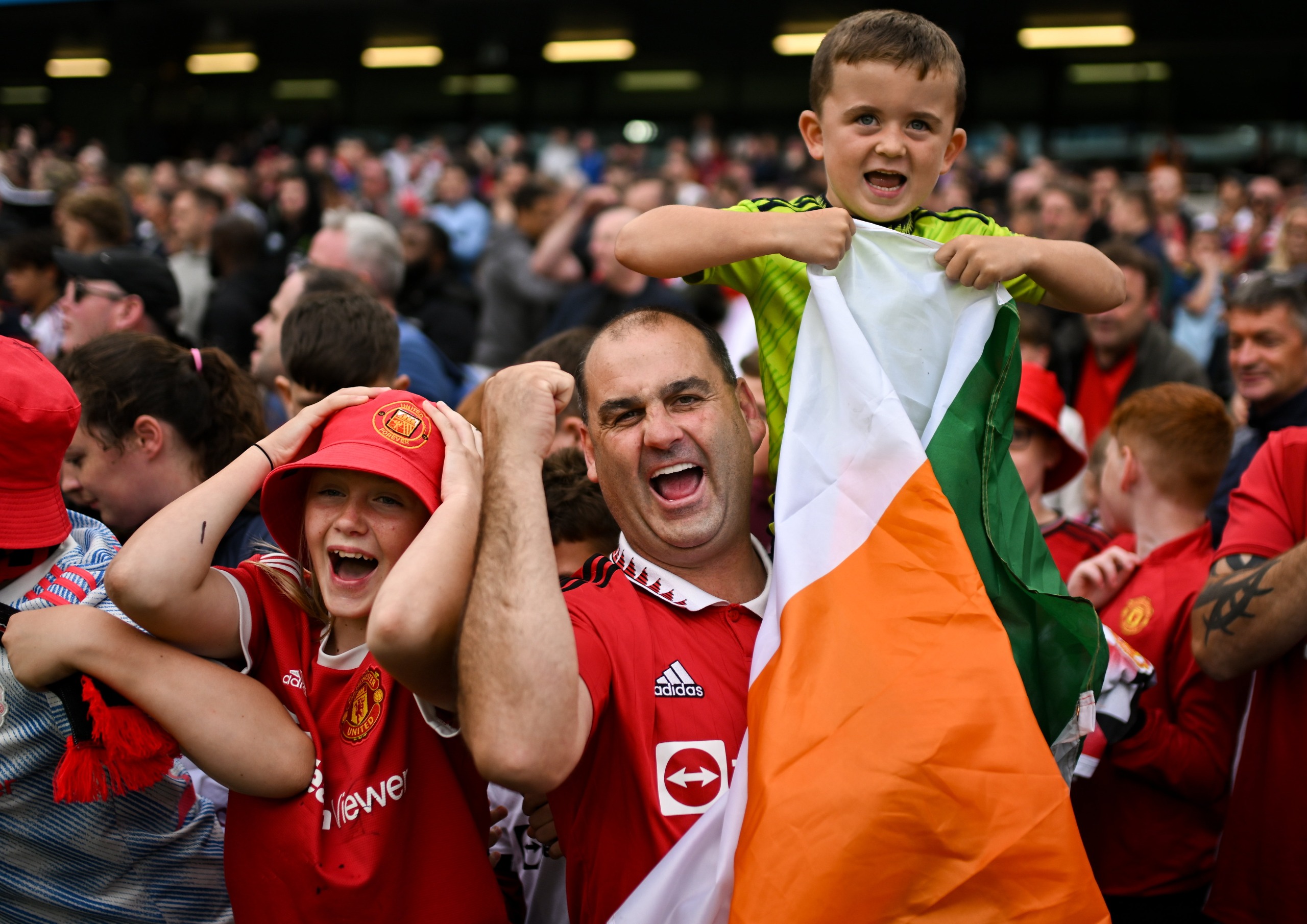 Manchester United supporters celebrate their side's first goal during the pre-season friendly match between Manchester United and Athletic Bilbao at the Aviva Stadium in Dublin.