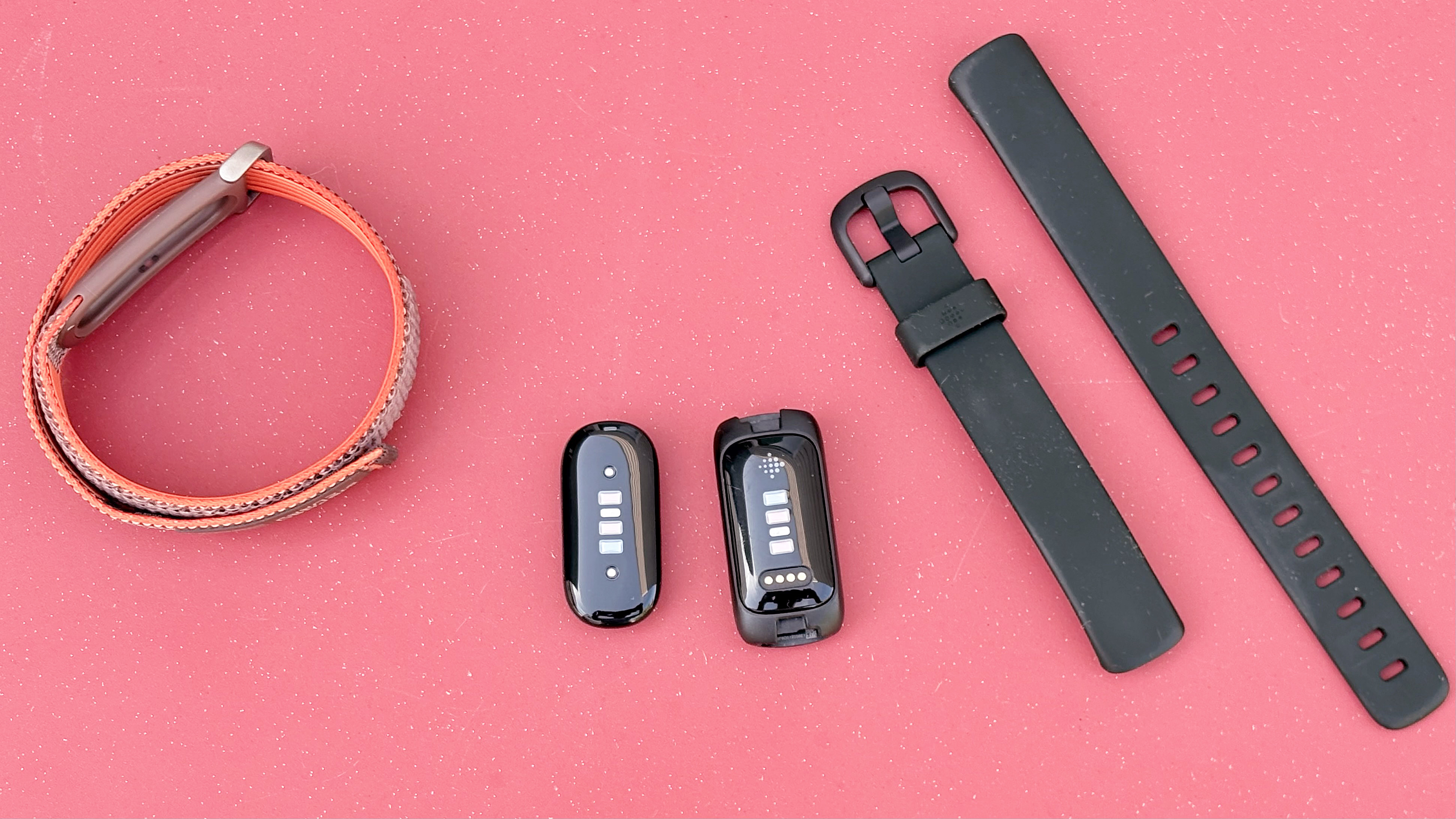 Close-up of the Fitbit Air next to the Fitbit Inspire 3