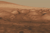 This oblique view of the lower mound in Gale crater shows layers of rock that preserve a record of environments on Mars.