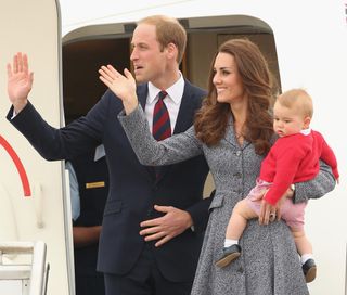 Catherine, Duchess of Cambridge, Prince William, Duke of Cambridge and Prince George of Cambridge leave Fairbairne Airbase