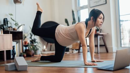 Woman doing prenatal pregnancy exercise