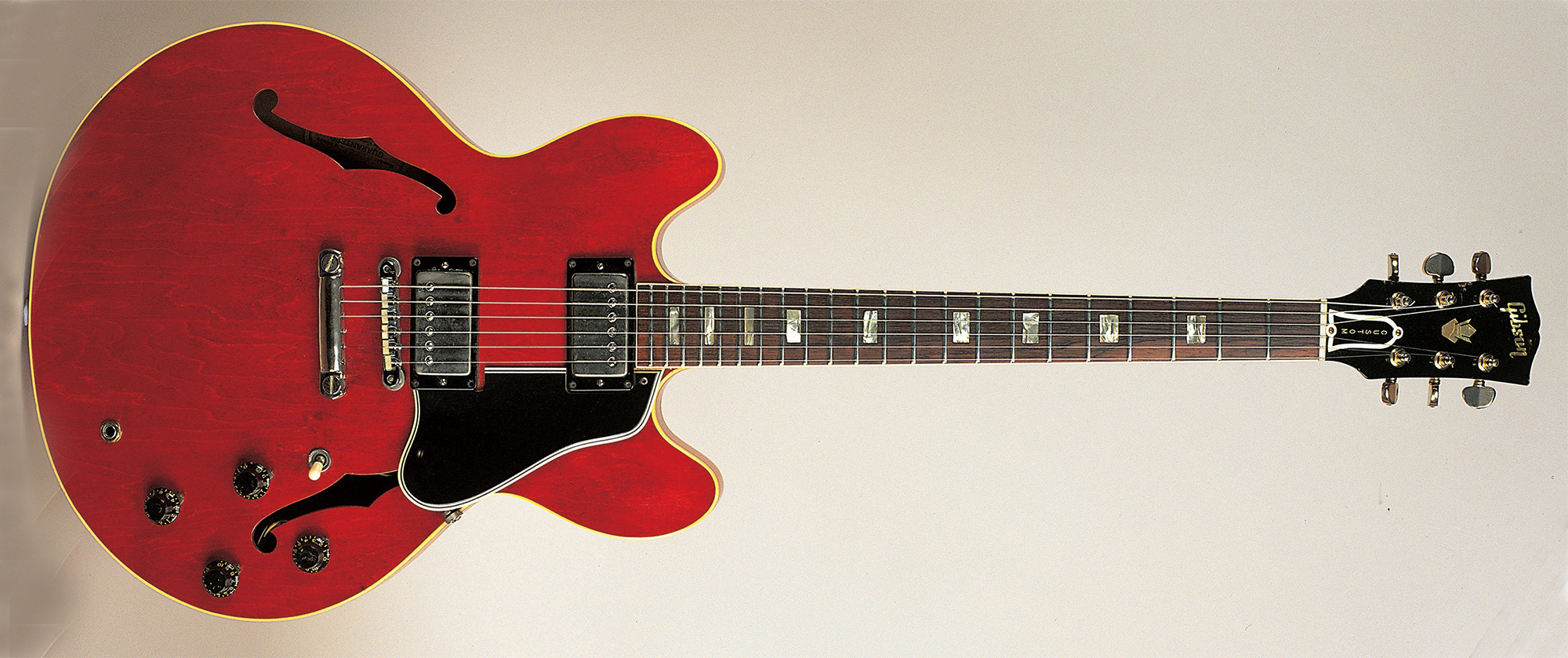 Studio still life of a 1964 Gibson ES-335 TDC owned by Eric Clapton guitar,