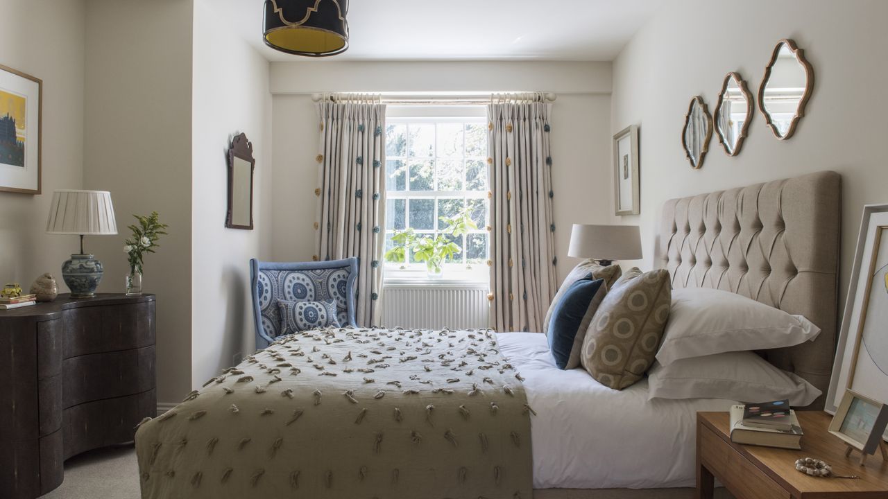 Beige bedroom with colored accessorises