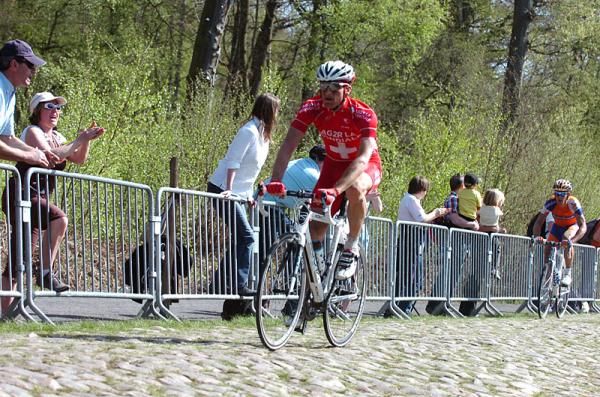 Swiss champion Martin Elmiger (AG2R) rides off the front of the break in the Arenberg Forest.