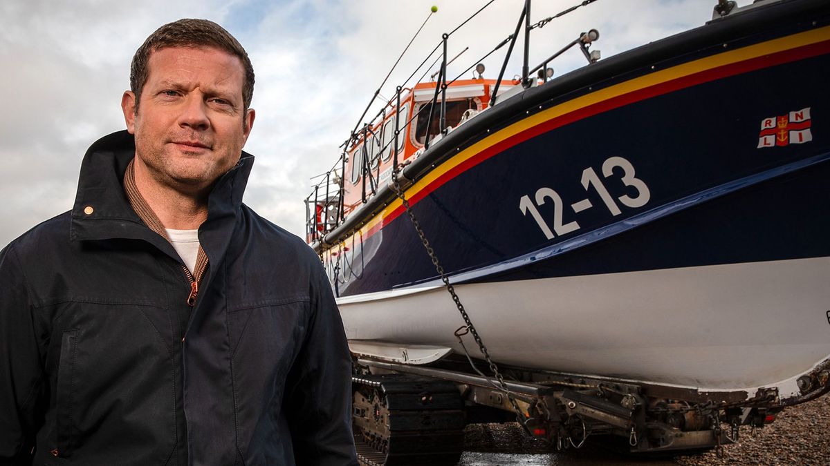 Saving Lives at Sea: In World War Two - Dermot O&#039;Leary poses next to a lifeboat