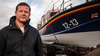 Saving Lives at Sea: In World War Two - Dermot O'Leary poses next to a lifeboat