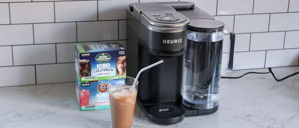 Keurig K-Brew+Chill next to an iced coffee 