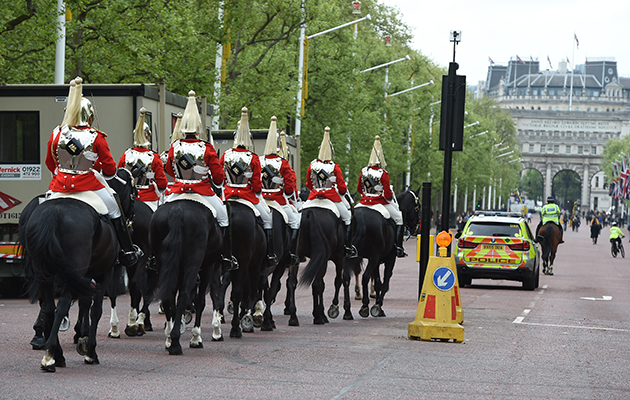 The soldiers head down The Mall, ready to change the guard at Horse Guards Parade