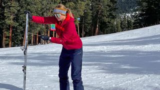 Kim Fuller skiing wearing Ibex Wool Aire Hoodie
