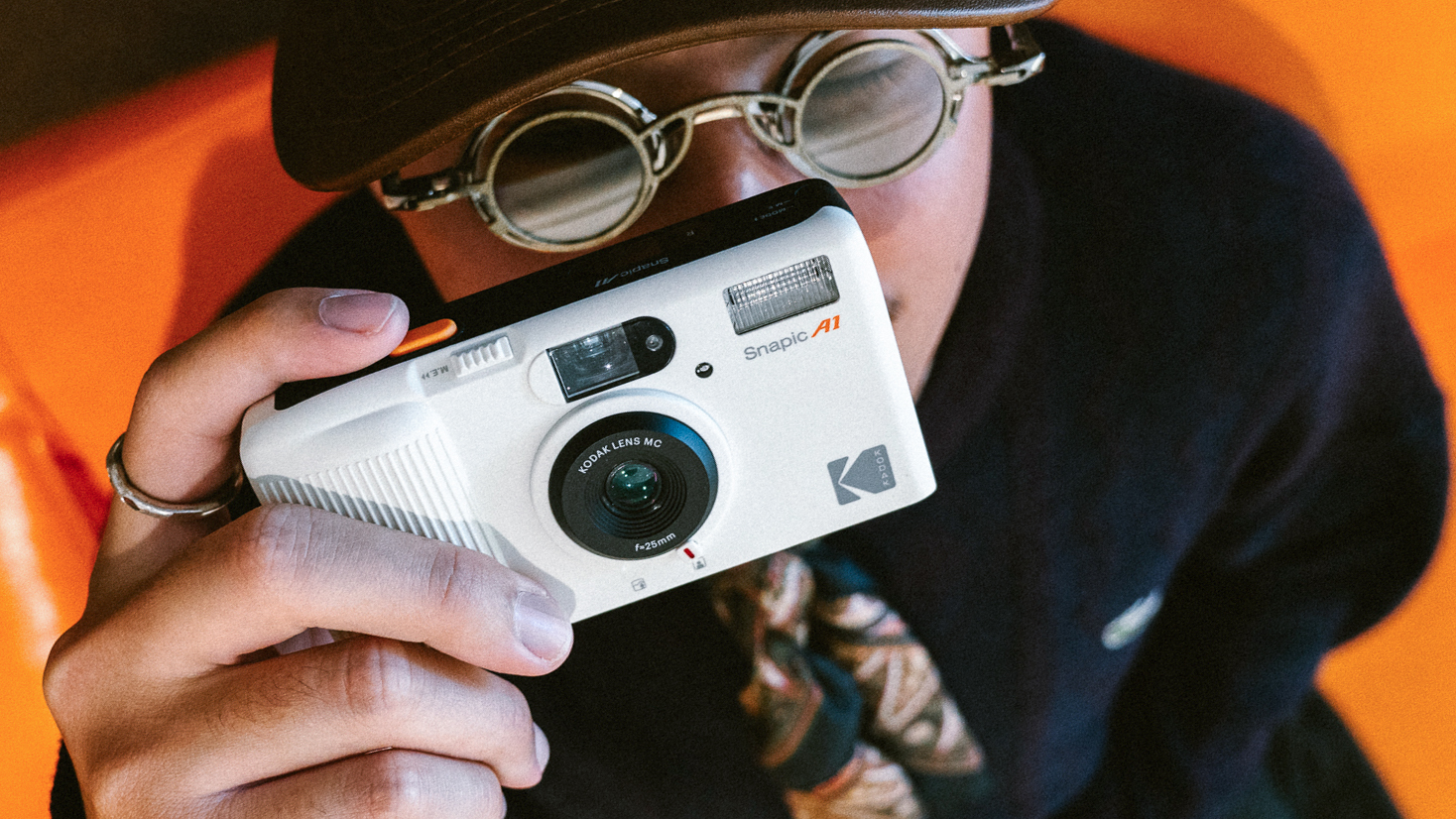 Kodak Snapic A1 being held by a man wearing glasses