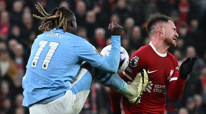 Liverpool midfielder Alexis Mac Allister is kicked by Manchester City&#039;s Jeremy Doku in a controversial incident late in the teams&#039; Premier League clash at Anfield in March 2024.