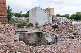 A former basement surrounded by rubble at the Santekhpribor factory, Kazan