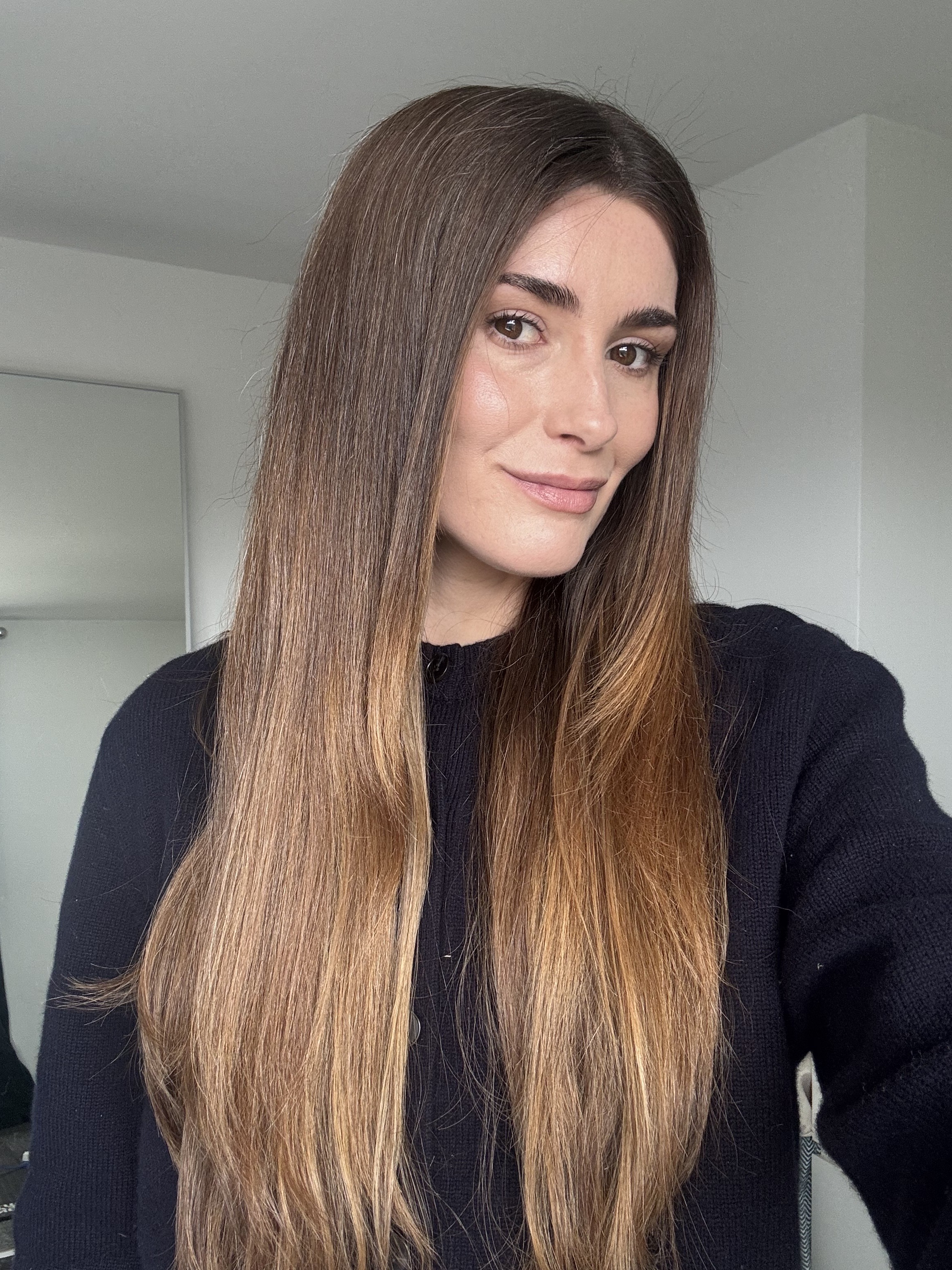 Eleanor after using the Hershesons The Great Iron to straighten her hair
