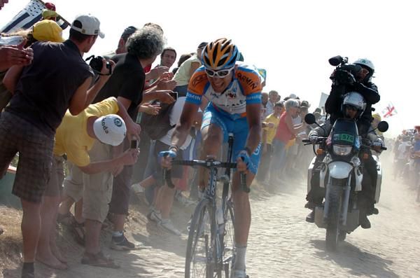 Ryder Hesjedal (Garmin - Transitions) rides alone at the front on the cobbles.