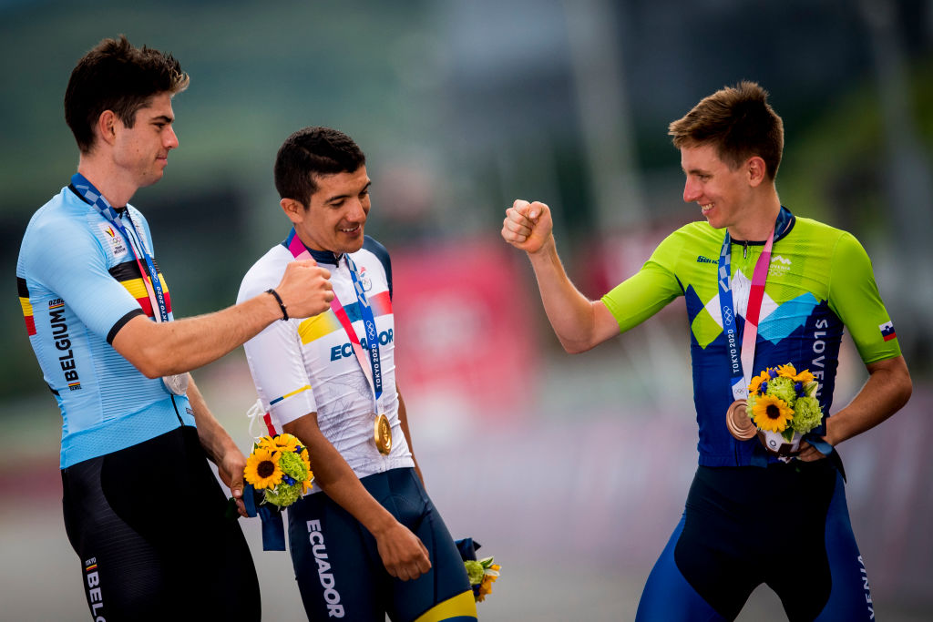 Belgian road cyclist Wout Van Aert, Ecuadorian Richard Carapaz of Ineos Grenadiers and Slovenian Tadej Pogacar of UAE Team Emirates pictured on the podium after the men&amp;amp;apos;s cycling road race, on the second day of the &amp;amp;apos;Tokyo 2020 Olympic Games&amp;amp;apos; with finish at the Fuji Speedway, in Gotenba, Tokyo, Japan on Saturday 24 July 2021. The postponed 2020 Summer Olympics are taking place from 23 July to 8 August 2021. BELGA PHOTO JASPER JACOBS (Photo by JASPER JACOBS/BELGA MAG/AFP via Getty Images)