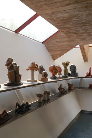 The top-floor gallery of Villa Caffetto displaying busts and other sculptures by Caffetto