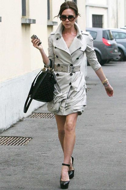 Victoria and David Beckham shopping in Milan - Burberry mac
