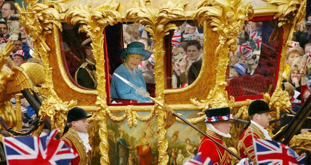 Queen Elizabeth in her gold carriage