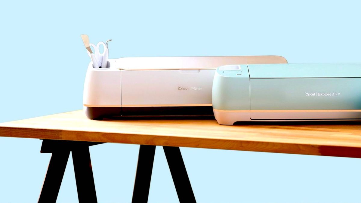 Two Cricut machines on a desk